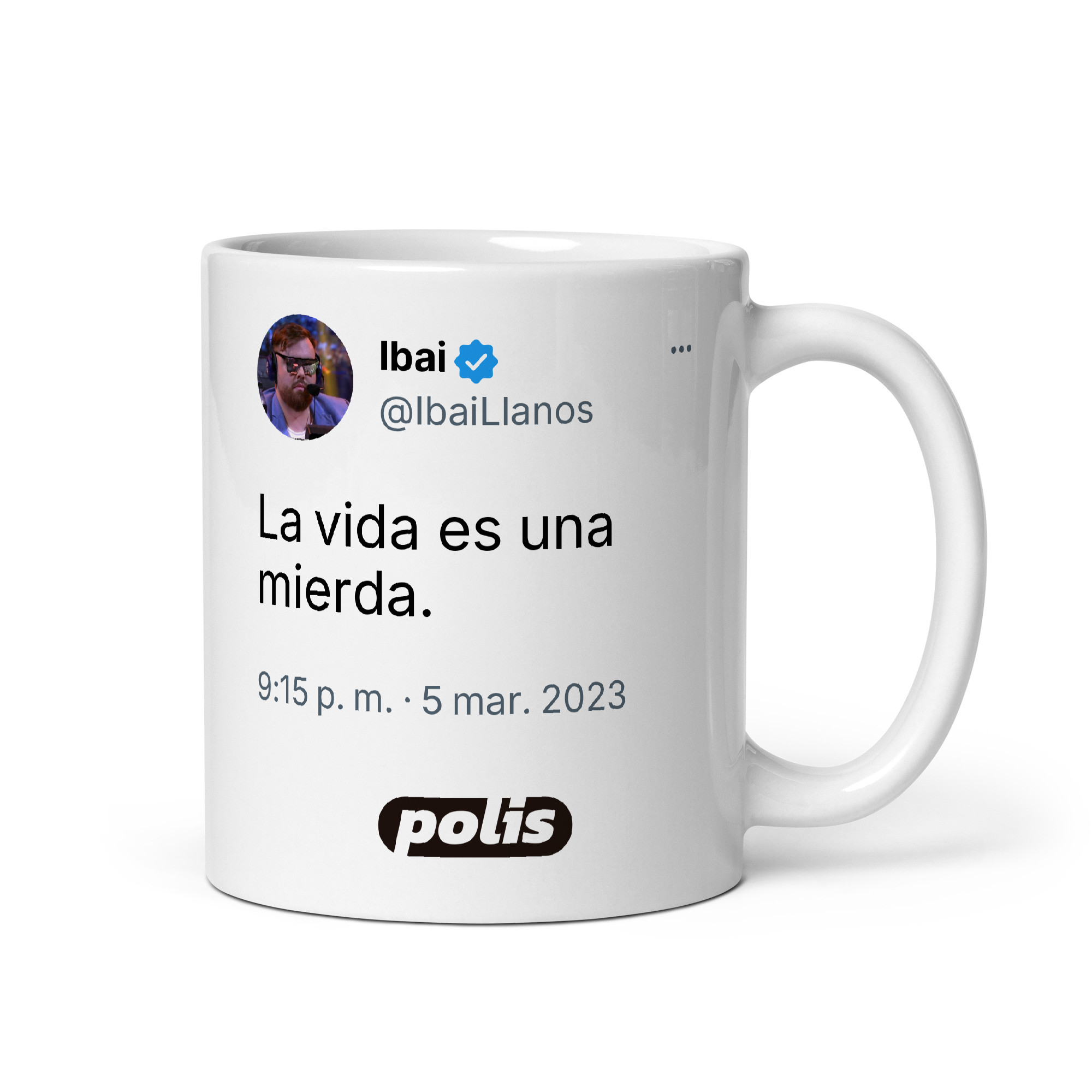 Taza blanca con el tuit de @IbaiLlanos: «La vida es una mierda.»